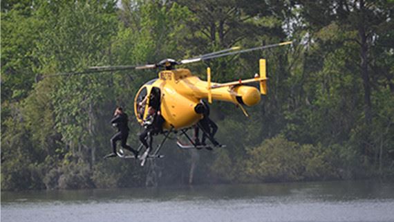 Rescue in a helicopter over a river